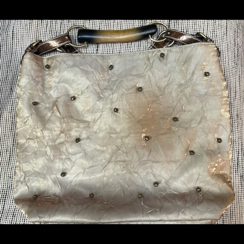 Nicole Lee collection gold purse with tiny bells